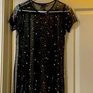 Black see-through dress with pearls. Long.